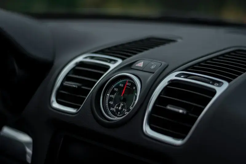 Silver and black car air vent